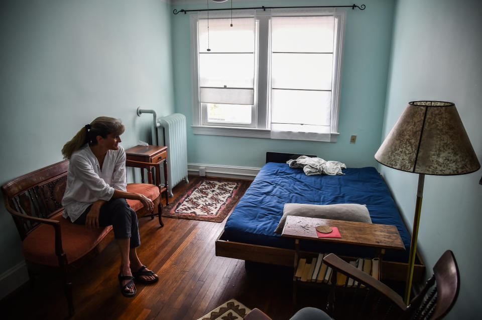 Irene Stevenson, 55, of Washington, D.C., sits in the room that she had prepared for&nbsp;an unaccompanied minor refugee from Africa whom she planned to foster. The travel ban upended the&nbsp;program. (Photo: Salwan Georges/The Washington Post via Getty Images)