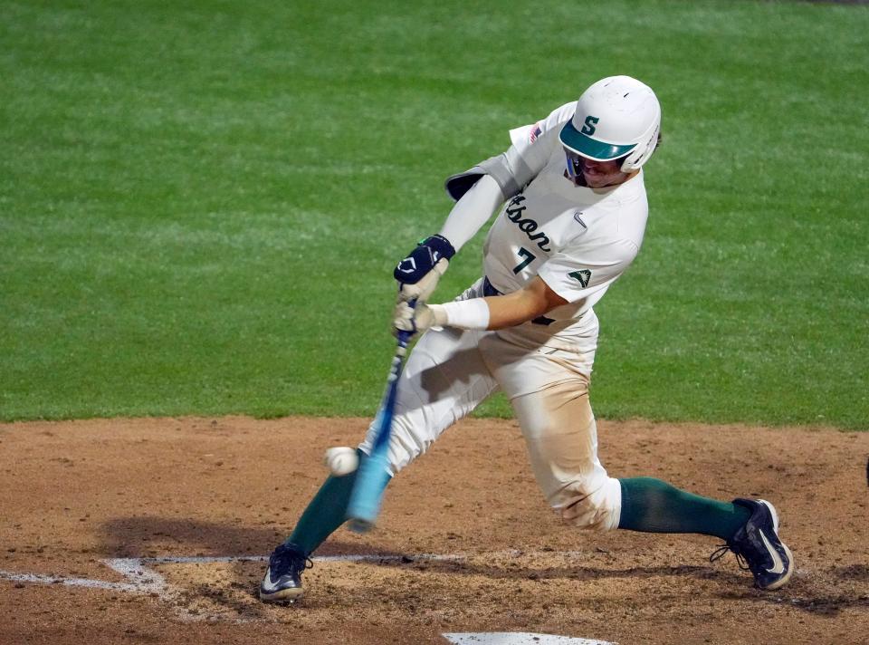 Stetson's Yohann Dessureault connects for a rbi double during a game with UCF at Melching Field at Conrad Park in DeLand, Wednesday, April 10, 2024.