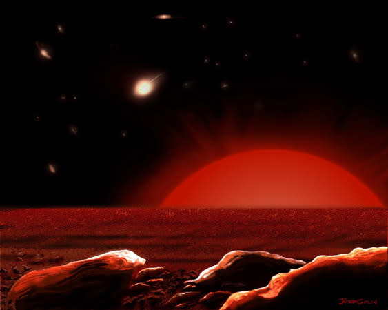 Artist's conception of the view of a hypothetical planet around a distant red giant star. Our sun is expected to swell in a few billion years to first fry Earth then engulf it.