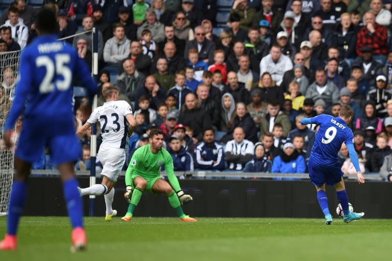 Leicester City's Jamie Vardy (R) scores opening goal during their English Premier League football match against West Bromwich Albion at The Hawthorns stadium in West Bromwich, central England, on April 29, 2017