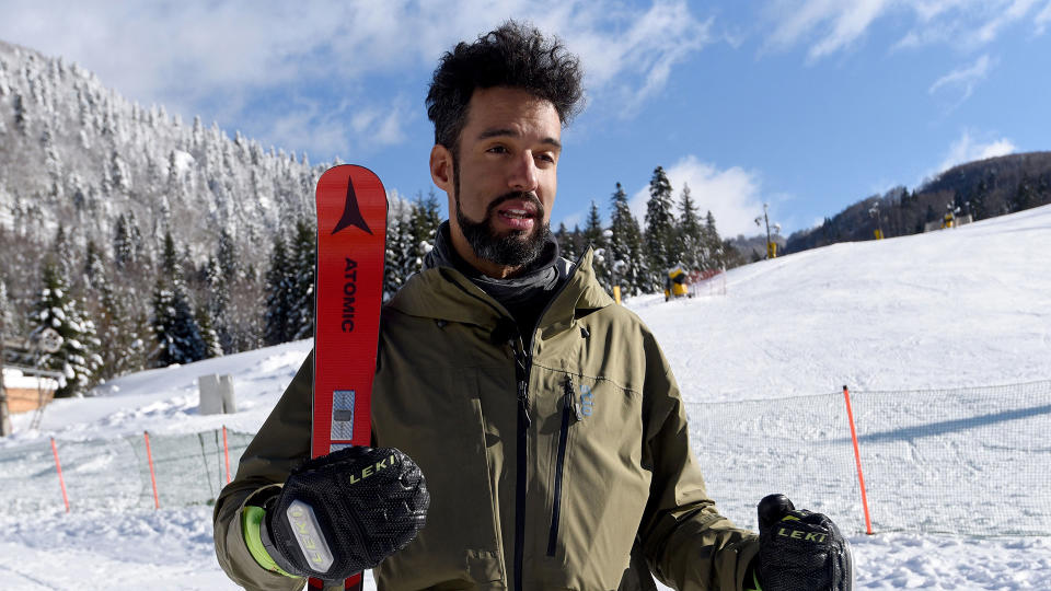 Jamaica's first Olympic alpine skier picked up the sport at age 32. (Photo by SAVO PRELEVIC/AFP via Getty Images)