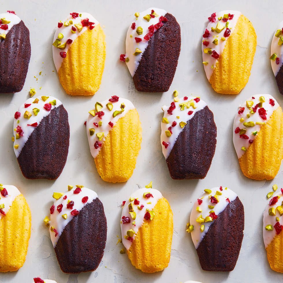 white chocolatedipped madeleines on white table