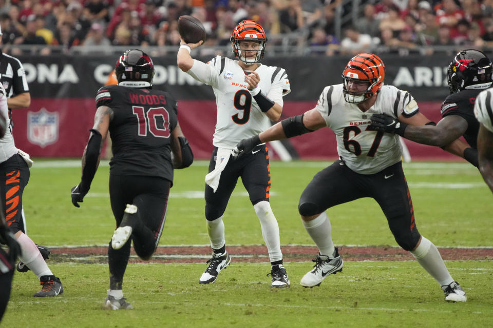 Cincinnati Bengals quarterback Joe Burrow (9) throws against the Arizona Cardinals during the second half of an NFL football game, Sunday, Oct. 8, 2023, in Glendale, Ariz. (AP Photo/Rick Scuteri)