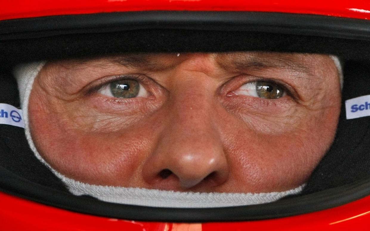 Michael Schumacher is 'conscious' after treatment in a Paris hospital, a French newspaper has claimed - AP