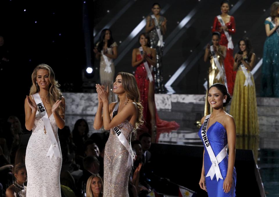 Finalists, (L-R) Miss USA Olivia Jordan, Miss Colombia Ariadna Gutierrez, and Miss Philippines Pia Alonzo Wurtzbach, celebrate after making it to the final three contestants during the 2015 Miss Universe Pageant in Las Vegas, Nevada December 20, 2015. Miss Philippines was later crowned Miss Universe 2015. REUTERS/Steve Marcus ATTENTION EDITORS - FOR EDITORIAL USE ONLY. NOT FOR SALE FOR MARKETING OR ADVERTISING CAMPAIGNS