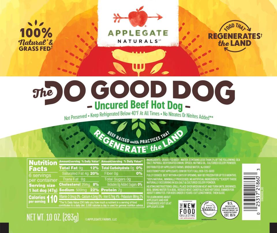 Applegate Naturals uncured beef hot dog package with label details, including nutrition facts and claims of 100% natural, grass-fed, and land-regenerative practices