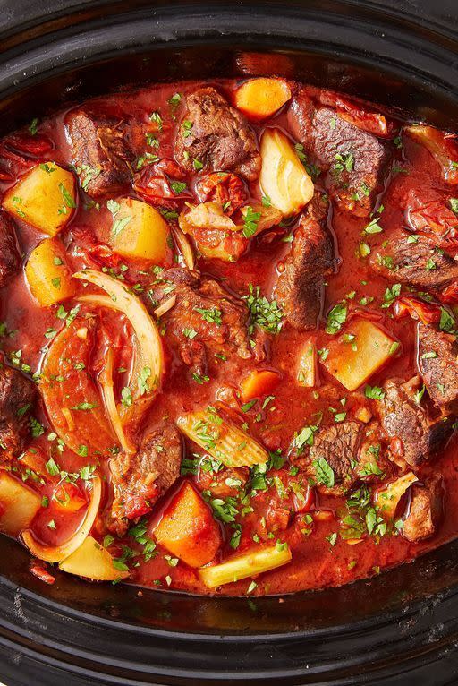<p>If you need an excuse to get your <a href="https://www.delish.com/uk/cooking/recipes/g30220431/slow-cooker-recipes/" rel="nofollow noopener" target="_blank" data-ylk="slk:slow cooker;elm:context_link;itc:0;sec:content-canvas" class="link ">slow cooker</a> out, this is it! Let everything cook together for hours for the deepest, most satisfying beef stew you'll try. Don't skip searing the <a href="https://www.delish.com/uk/cooking/recipes/g34447871/leftover-beef-recipes/" rel="nofollow noopener" target="_blank" data-ylk="slk:beef;elm:context_link;itc:0;sec:content-canvas" class="link ">beef</a> — it creates more deeply flavoured meat that develops the flavour of the <a href="https://www.delish.com/uk/cooking/recipes/g28844124/slow-cooker-beef-stew/" rel="nofollow noopener" target="_blank" data-ylk="slk:stew;elm:context_link;itc:0;sec:content-canvas" class="link ">stew</a> even further. </p><p>Get the <a href="https://www.delish.com/uk/cooking/recipes/a28830324/slow-cooker-red-wine-beef-stew-recipe/" rel="nofollow noopener" target="_blank" data-ylk="slk:Slow Cooker Red Wine Beef Stew;elm:context_link;itc:0;sec:content-canvas" class="link ">Slow Cooker Red Wine Beef Stew</a> recipe.</p>