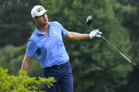 Harris English reacts as he watches his shot on the third tee during the third round in the World Golf Championship-FedEx St. Jude Invitational tournament, Saturday, Aug. 7, 2021, in Memphis, Tenn. (AP Photo/John Amis)