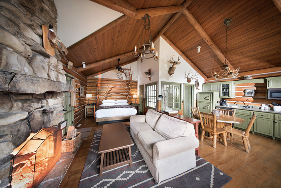<p>There's plenty to keep the whole family busy at the 4,600-acre <a href="https://bigcedar.com/" rel="nofollow noopener" target="_blank" data-ylk="slk:Big Cedar Lodge" class="link ">Big Cedar Lodge</a> in Ridgedale, Missouri, with winter activities including ice skating, nightly campfires for roasting s'mores, and "Fun Mountain," a 50,000 square foot entertainment complex with games, bumper cars, bowling, and laser tag. Stay in one of the lodge's <a href="https://bigcedar.com/accommodations/log-cabins/" rel="nofollow noopener" target="_blank" data-ylk="slk:private log cabins" class="link ">private log cabins</a>, which can sleep up to 10 and include kitchens, fireplaces, and private decks with grills. </p>