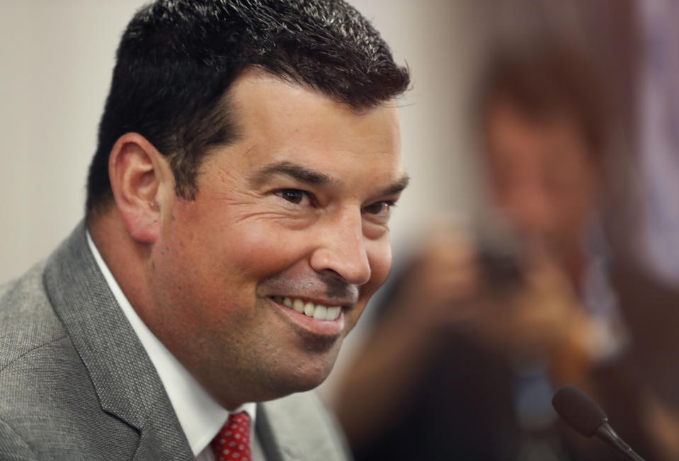 Ohio State head coach Ryan Day smiles as he talks to reporters during the Big Ten Conference NCAA college football media days Thursday, July 18, 2019, in Chicago. (AP Photo/Charles Rex Arbogast)