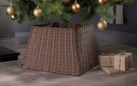 Taylor & Brown Rattan Wicker Christmas Tree Skirt - Credit: Amazon