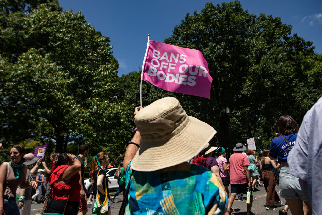   Abortion-rights activists march to the U.S. Supreme Court on June 24, 2023 . 