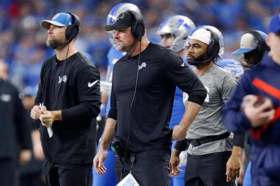 Detroit Lions head coach Dan Campbell watches from the sidelines during the first half against the L.A. Rams at Ford Field in Detroit on Sunday, Jan. 14, 2024.