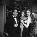 <p>Hollywood golden couple, Lauren Bacall and Humphrey Bogart, celebrate Christmas Eve with their son, Stephen Bogart, in their home in California.</p>