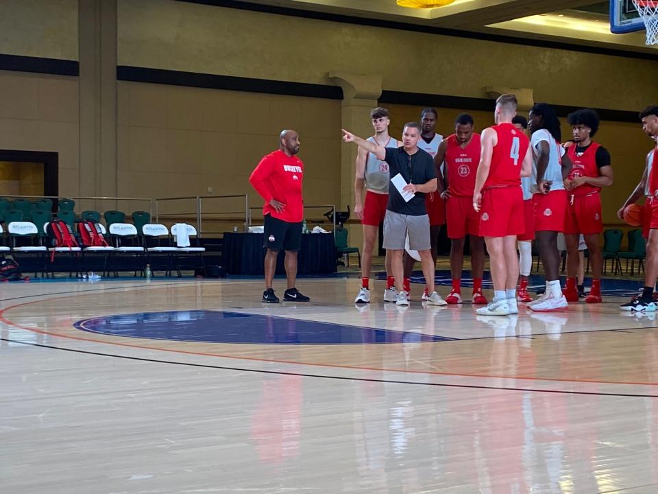 Ohio State coach Chris Holtmann instructs his players inside the Imperial Arena at the Atlantis resort in the Bahamas.