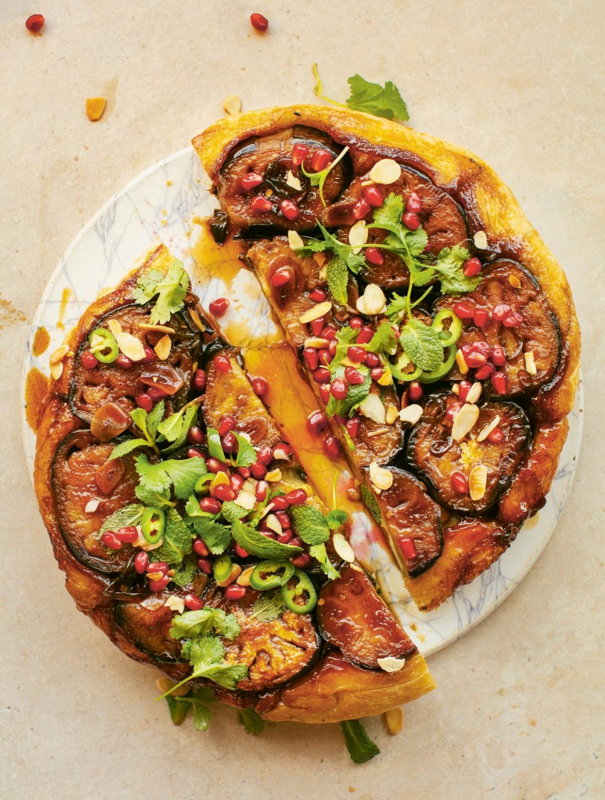 Sticky aubergine, pomegranate and herb tart