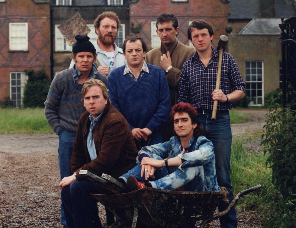 <span>That’s living all right … (clockwise from bottom left) Timothy Spall, Christopher Fairbank, Pat Roach, Tim Healy, Jimmy Nail, Kevin Whately, Gary Holton.</span><span>Photograph: ITV/Rex/Shutterstock</span>