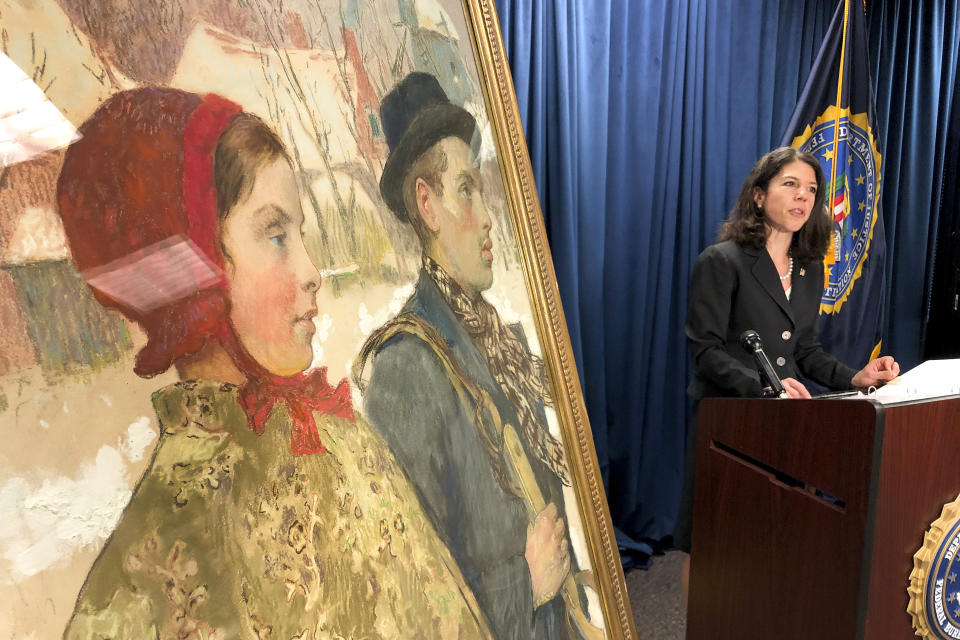 Acting U.S Attorney for the Northern District of New York, Antoinette T. Bacon, speaks at a repatriation ceremony for the painting "Winter" Thursday, Oct. 15, 2020, in Albany, N.Y. The painting, discovered in an upstate New York museum, was part of a cache of art seized by the Nazis from the Mosse family in Berlin in 1933. (AP Photo/Michael Hill)