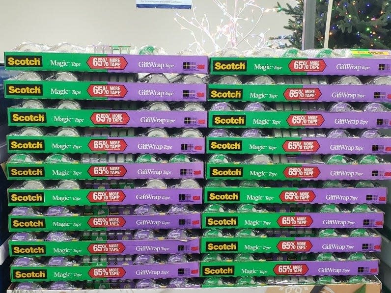 green and purple Stack of boxes of scotch tape at Costco