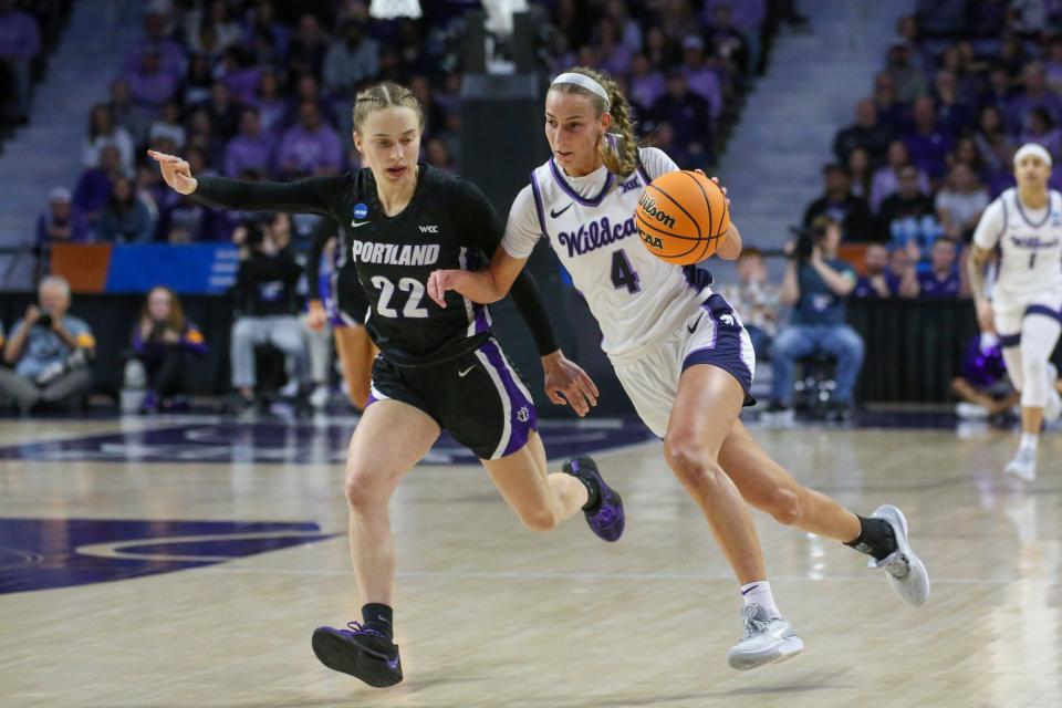 Kansas State guard Serena Sundell (4) brings the ball up court against Portland's Rhyan Mogel (22) during their first-round NCAA Tournament game Friday at Bramlage Coliseum.