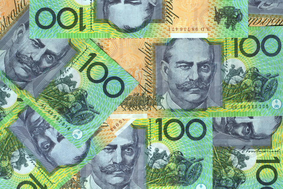 Pictured: Australian $100 notes. Image: Getty