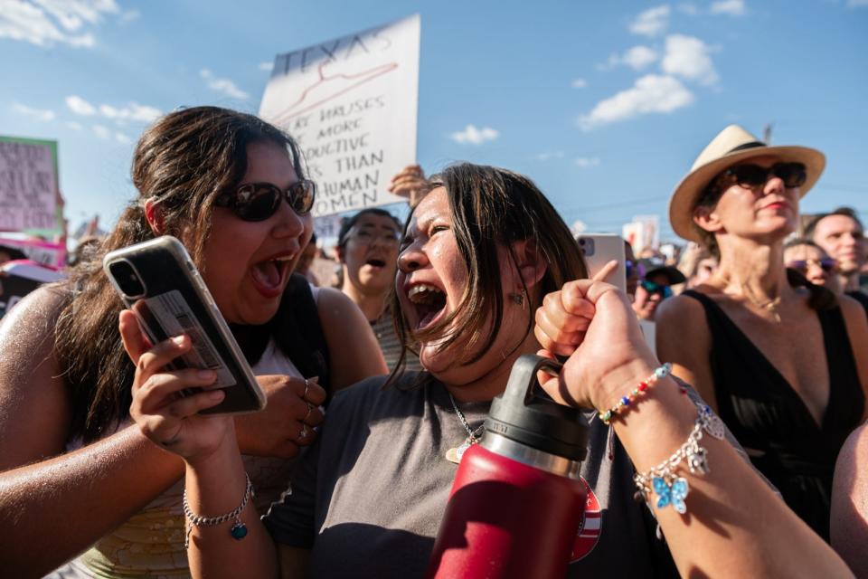 Abortion rights supporters at Sunday's rally were told they need to vote Republicans out of office in November.