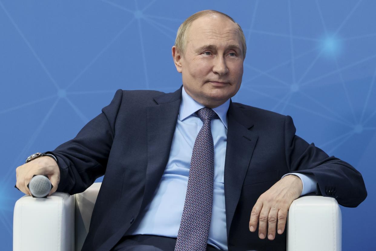 Russian President Vladimir Putin attends a meeting with young entrepreneurs and startup developers on the eve of the St. Petersburg International Economic Forum (SPIEF), at the Technograd Training Complex in Moscow, Russia, Thursday, June 9, 2022. (Mikhail Metzel, Sputnik, Kremlin Pool Photo via AP)