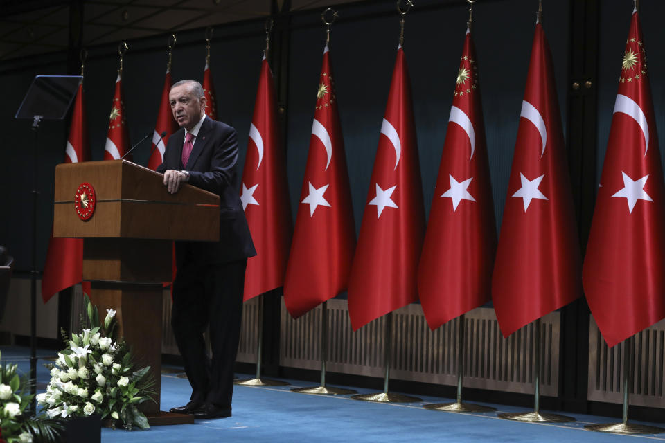 FILE - Turkey's President Recep Tayyip Erdogan speaks after he signed a decision confirming the election date, in Ankara, Turkey, Friday, March 10, 2023. Turkish President Recep Tayyip Erdogan says Russia has agreed to extend a deal that has allowed Ukraine to ship grain through the Black Sea to parts of the world struggling with hunger. Erdogan said Wednesday that the deal would be extended for two months. (AP Photo/Burhan Ozbilici, File)