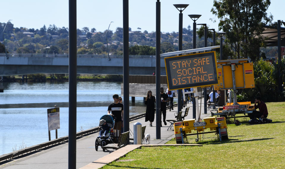 SYDNEY, AUSTRALIA - SEPTEMBER 12: People walk in a park in the suburb of Rhodes on September 12, 2020 in Sydney, Australia. Six new COVID-19 cases were recorded in NSW in the last 24 hour reporting period with one being in hotel quarantine and five linked to a known case or clusters. The total deaths in Australia from COVID-19 now stands at 797. (Photo by James D. Morgan/Getty Images)