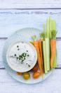 <p>Dunk 1 cup mixed crudités in a creamy, cheesy dip that's 1/2 cup 0% plain Greek yogurt mixed with 1 wedge <a href="https://www.amazon.com/Laughing-Cow-Cheese-Light-Wedges/dp/B000Q6LY26?tag=syn-yahoo-20&ascsubtag=%5Bartid%7C10055.g.4994%5Bsrc%7Cyahoo-us" rel="nofollow noopener" target="_blank" data-ylk="slk:Laughing Cow Light Swiss Cheese;elm:context_link;itc:0;sec:content-canvas" class="link ">Laughing Cow Light Swiss Cheese</a>. Curb cravings later on with a single-serving pack of <a href="https://www.amazon.com/Wonderful-Pistachios-Shells-Roasted-Salted/dp/B07XSKK6Z4/ref=sr_1_1?tag=syn-yahoo-20&ascsubtag=%5Bartid%7C10055.g.4994%5Bsrc%7Cyahoo-us" rel="nofollow noopener" target="_blank" data-ylk="slk:Wonderful Pistachios No Shells Single Serving;elm:context_link;itc:0;sec:content-canvas" class="link ">Wonderful Pistachios No Shells Single Serving</a> and 1/2 a container of <a href="https://go.redirectingat.com?id=74968X1596630&url=https%3A%2F%2Fwww.instacart.com%2Fproducts%2F16694181-siggi-s-icelandic-style-skyr-non-fat-yogurt-vanilla-5-3-oz&sref=https%3A%2F%2Fwww.goodhousekeeping.com%2Fhealth%2Fdiet-nutrition%2Fg4994%2F1800-calorie-diet%2F" rel="nofollow noopener" target="_blank" data-ylk="slk:Siggi's Nonfat Yogurt;elm:context_link;itc:0;sec:content-canvas" class="link ">Siggi's Nonfat Yogurt</a> paired with 1/2 cup fresh or frozen berries.</p>