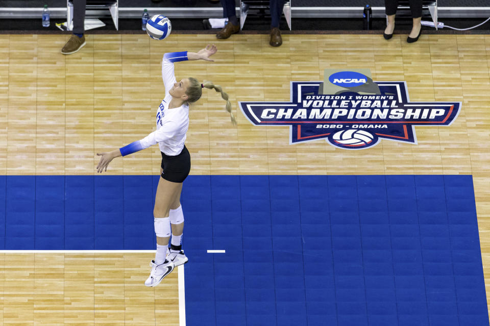 FILE - In this April 24, 2021, file photo, Kentucky's Alli Stumler (17) serves the ball against Texas during the finals in the NCAA women's volleyball championships in Omaha, Neb. Stumler was a first-team All-American for national champion Kentucky. The new season begins this week and will run on its traditional schedule, with the champion crowned in December. (AP Photo/John Peterson)