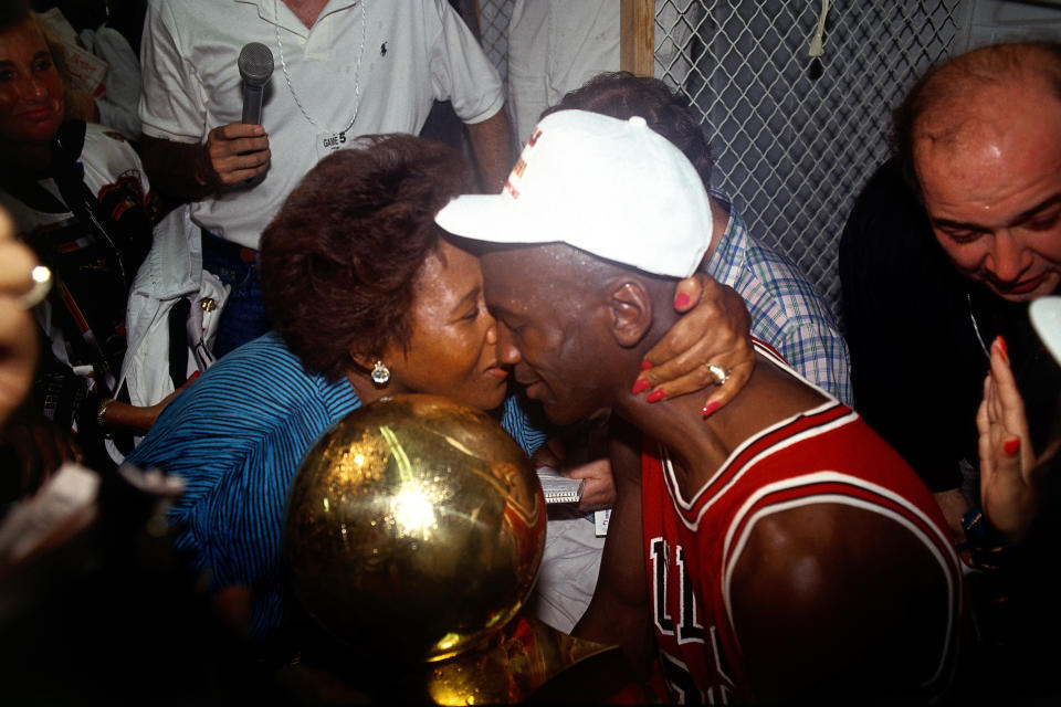 Michael Jordan #23 of the Chicago Bulls gets congratulated by his mom after winning the 1991 NBA Championship against the Los Angeles Lakers in Los Angeles, CA. HIGH RESOLUTION FILE 42MB. NOTE TO USER: User expressly acknowledges and agreesthat, by downloading and/or using this Photograph, User is consenting to the terms and conditions of the Getty Images License Agreement. Mandatory copyright notice and Credit: Copyright 2001 NBAE Mandatory Credit: Nathaniel S. Butler/NBAE/Getty Images