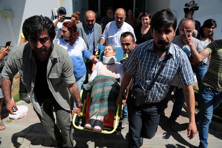 Pro-Kurdish Peoples' Democratic Party (HDP) lawmaker Leyla Guven, who ends her hunger strike after a call from jailed militant leader Abdullah Ocalan, leaves her home to go to hospital in Diyarbakir, Turkey, May 26, 2019. REUTERS/Sertac Kayar