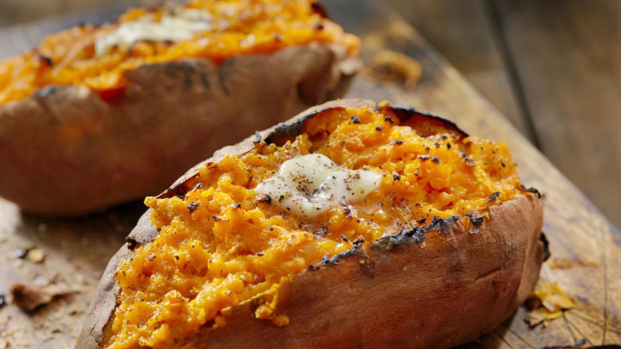 twice baked, stuffed sweet potatoes with melting butter and cracked pepper