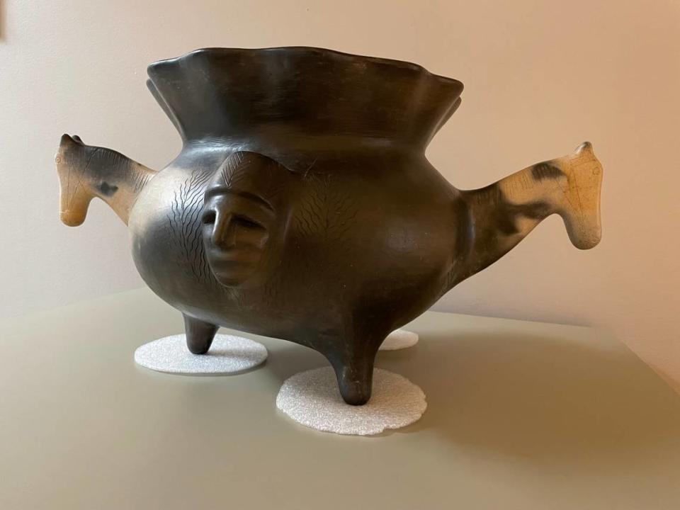 Learn about Catawba Nation pottery like this piece by Earl Robbins at the Charlotte Museum of History.