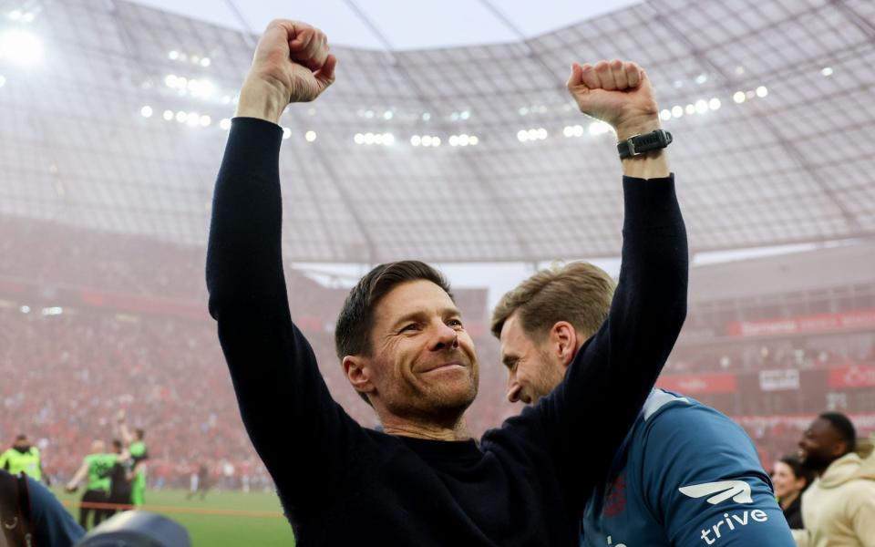 Xabi Alonso celebrates winning the Bundesliga with Bayer Leverkusen