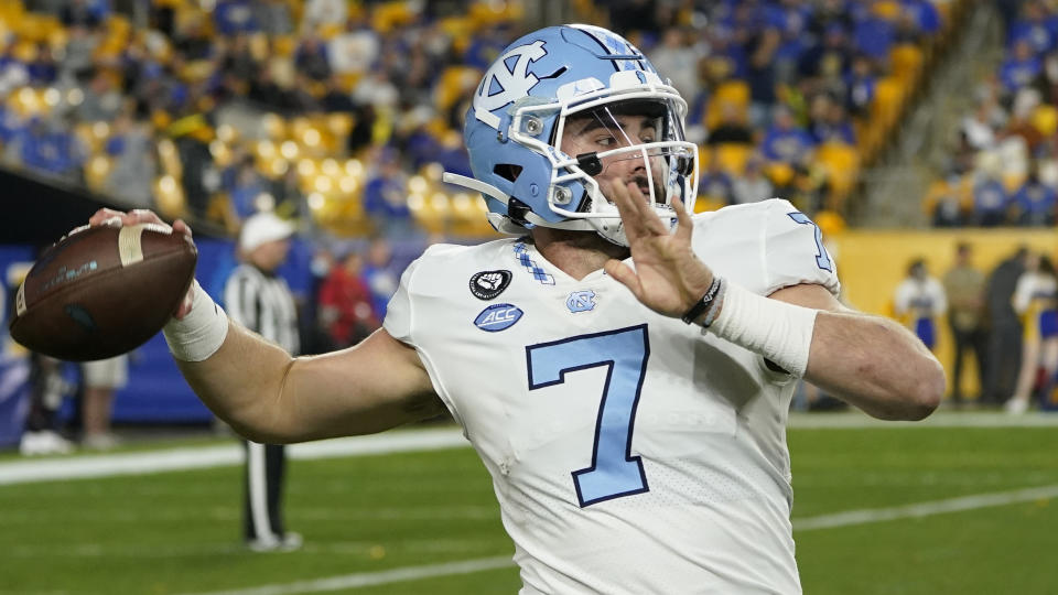 North Carolina quarterback (7) throws the ball along the sideline during a break in the action against Pittsburgh in the first half of an NCAA college football game, Thursday, Nov. 11, 2021, in Pittsburgh. (AP Photo/Keith Srakocic)