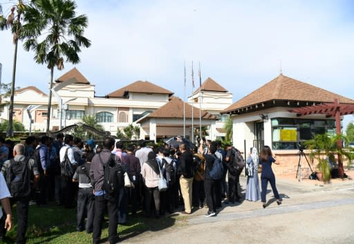 Reporters crowd outside a building where new Prime Minister Mahathir Mohamad was starting his first day in office at Perdana Leadership Foudation in Putrajaya