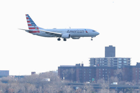 An American Airlines Boeing 737 Max 8, on a flight from Miami to New York City, comes in for landing at LaGuardia Airport in New York, U.S., March 12, 2019. REUTERS/Shannon Stapleton