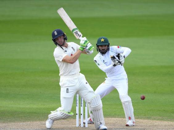 Jos Buttler hits out watched on by Mohammad Rizwan (Getty)