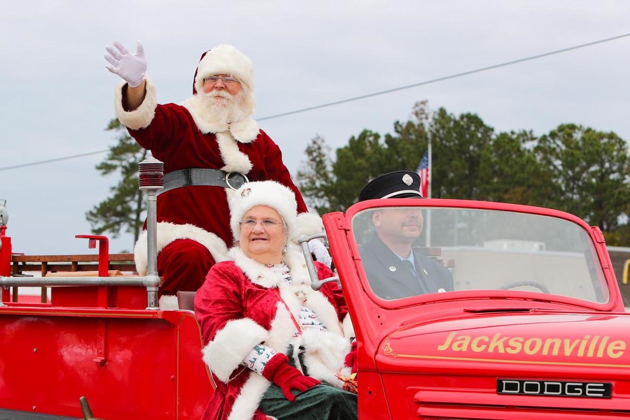 Thousands usually line Western Boulevard for the Jacksonville Holiday Christmas parade. Santa waves to the crowd during the 2019 parade.