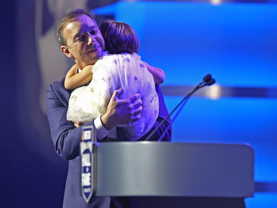 NASCAR Hall of Fame member Chad Knaus hugs his daughter, Vivienne during the NASCAR Hall of Fame induction ceremony in Charlotte, NC on Friday, January 19, 2024.