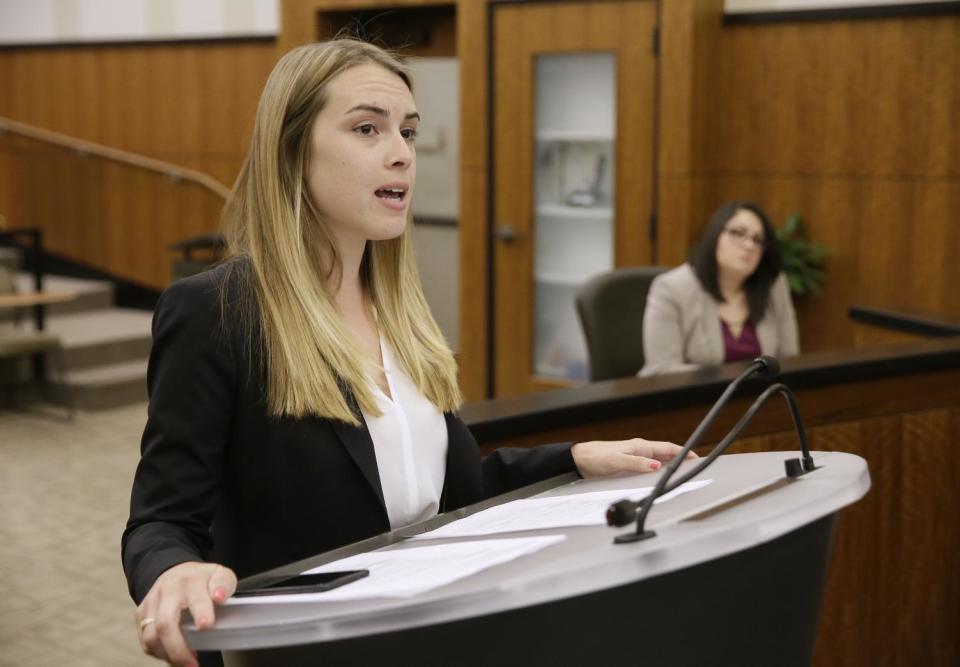 In this photo taken Monday, March 13, 2017, student Michelle Freeman, left, practices her argument in a moot courtroom at the University of California, Hastings College of the Law in San Francisco. Listening at right is student Deborah Rodriguez. The students will have the opportunity to argue at the 9th Circuit, the nation's largest federal appeals court, under an unusual program that offers law schools the opportunity to take on appeals. Over the course of a year, students spend countless hours researching their cases and writing briefs. The experience culminates in a 15-minute presentation before a judicial panel. (AP Photo/Eric Risberg)