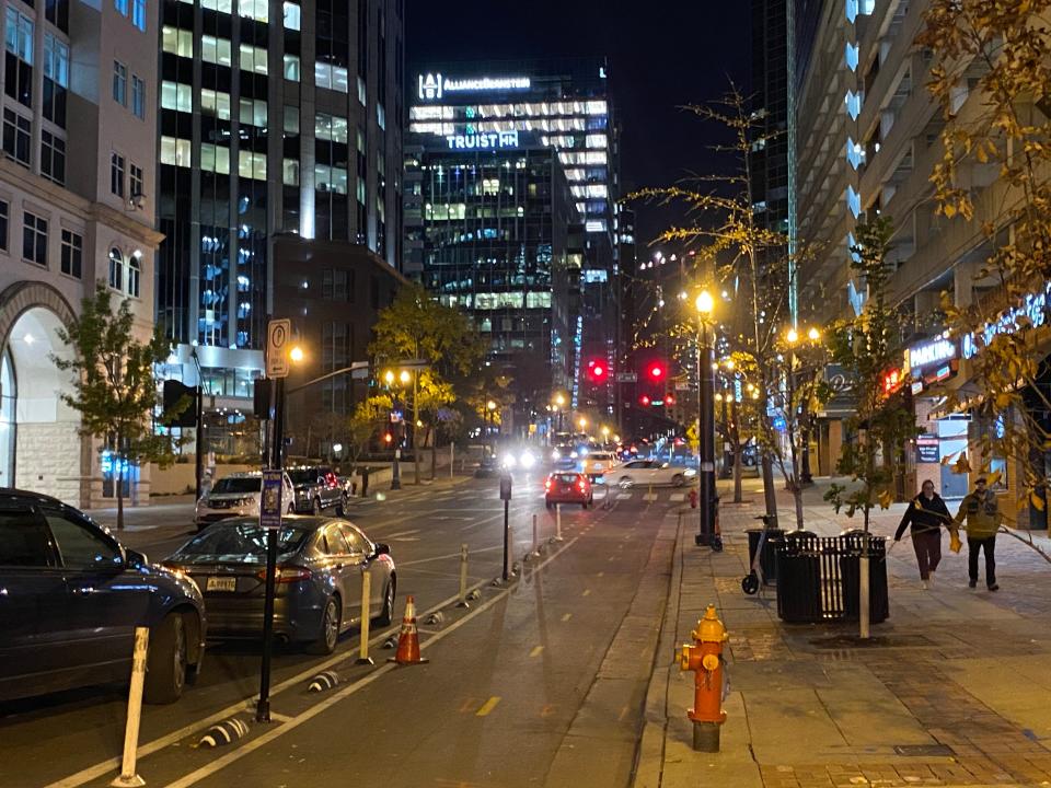 Vehicles and pedestrians travel on Commerce Street near Second Ave. on Nov. 29, 2023.