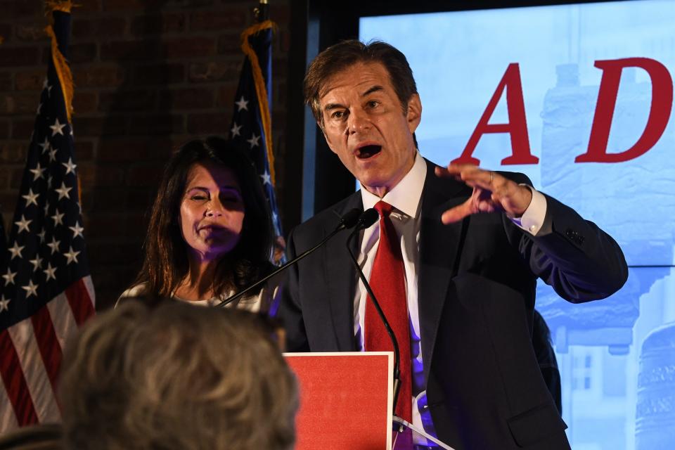 Republican U.S. Senate candidate Mehmet Oz greets supporters after the primary race resulted in an automatic re-count due to close results on May 17, 2022 in Newtown, Pennsylvania.