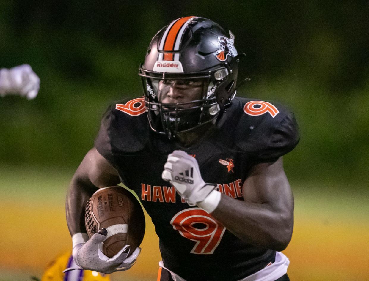 Hawthorne Hornets running back Keenon Johnson (9) runs as the Hawthorne Hornets takes on the Union County Fightin’ Tigers at Hawthorne High School in Hawthorne, FL on Friday, October 13, 2023. [Alan Youngblood/Gainesville Sun]