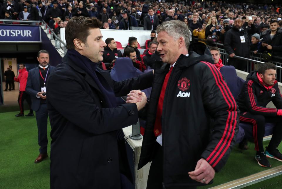 Former Spurs coach Pochettino (left) has been sounded out by United, sources sayTottenham Hotspur FC via Getty Images