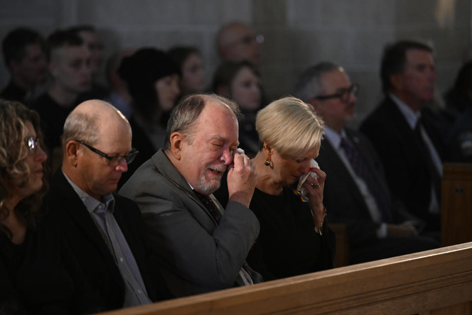 Jeff and Sabrina Aston morn their son, Daniel Aston, during a memorial service held for him at Shove Memorial Chapel on the Colorado College's campus on Dec. 7, 2022, in Colorado Springs, Colo. Aston, a 28-year-old transgender man, was one of five people killed in the Club Q mass shooting on Nov. 19. (RJ Sangosti/The Denver Post via AP, Pool)