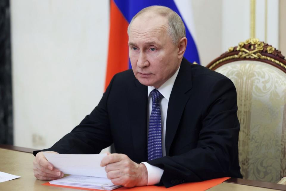 Russian President Vladimir Putin chairs a Security Council meeting (AP)
