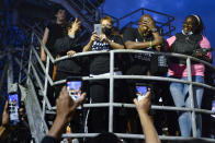 FILE - In this Sept. 4, 2020, file photo, Joe Prude, center, brother of Daniel Prude, pauses while speaking to the crowd gathered during a rally in Dr. Martin Luther King, Jr. Memorial Park in Rochester, N.Y. In a decision announced Tuesday, Feb. 23, 2021, a grand jury voted not to charge officers shown on body camera video holding Daniel Prude down naked and handcuffed on a city street last winter until he stopped breathing. Joe Prude said Wednesday, Feb. 24 he had viewed police body camera footage showing what happened after officers caught up with Daniel Prude, naked on a frigid March night, as irrefutable proof of a crime. (AP Photo/Adrian Kraus, File)